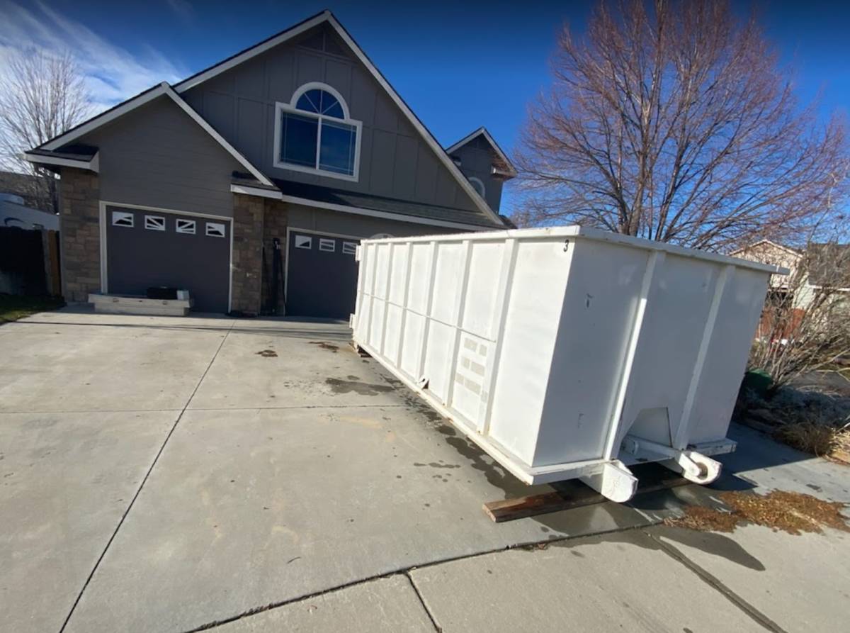 dumpster rental services dumpster in driveway with treasure valley disposal